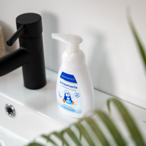 a bottle of soap on a sink