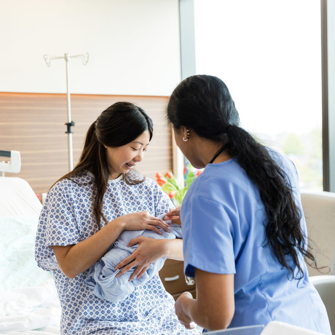 mother and baby being helped by midwive 